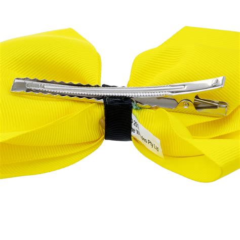 Children are coming to the show. The Wiggles Emma Ballerina Bow Clip - Yellow | BIG W