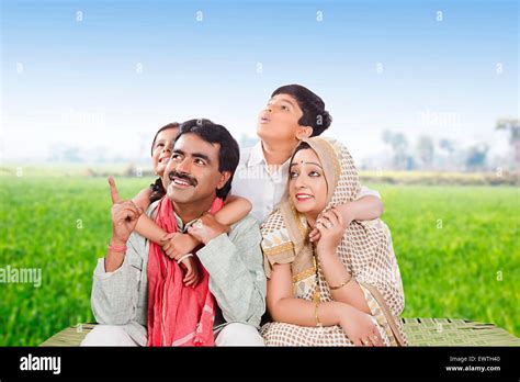Indian Parents Kids Sitting Enjoy Hi Res Stock Photography And Images