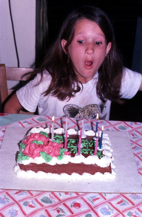 Florida Memory Girl Blowing Out Candles On A Birthday Cake