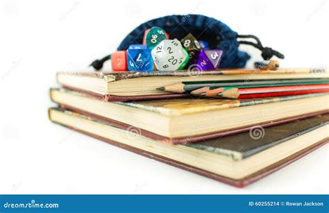 Dice And Pencils On Top Of Books Stock Photo Image Of Paper Sided