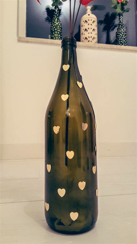 You can leave it on your bottle for an interesting look. DIY : How to Reuse Wine Bottles as Flower Vases - Shrads