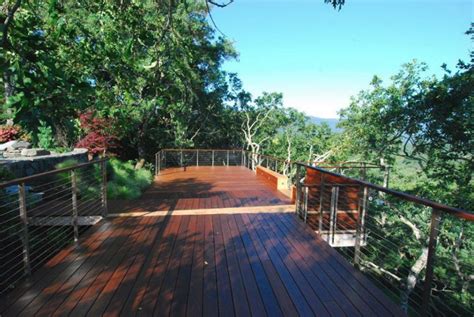 Not only does it allow for better views, but it's easier to install and uses less wood than a traditional railing. Clearview® DIY Cable Railing = beautiful professional results | Stainless steel railing, Deck ...