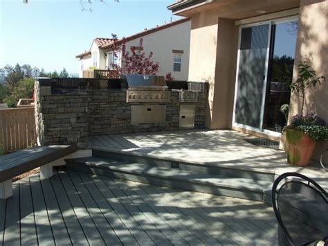 Watching him i realized that like the grills in a hibachi restaurant, an outdoor kitchen is center stage. Trex Deck & Outdoor Kitchen