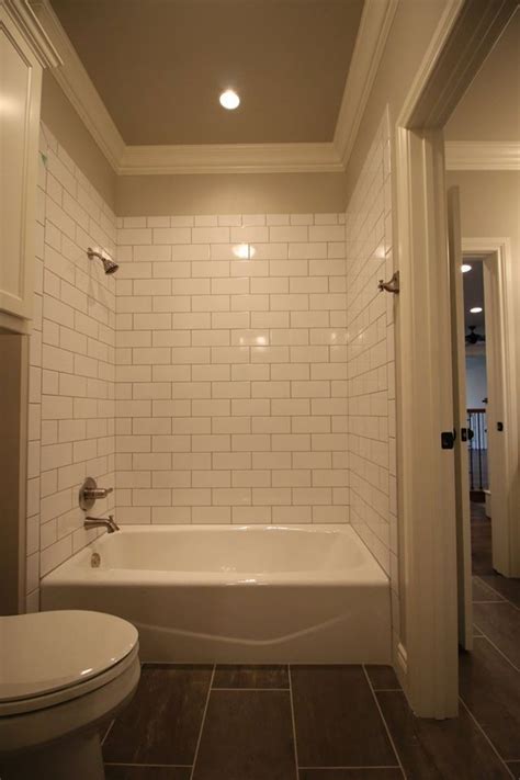 The use of a vast array of green hues has made it look unbelievably stunning. Jack and Jill Bath. Subway Tile Surround, molding and ...