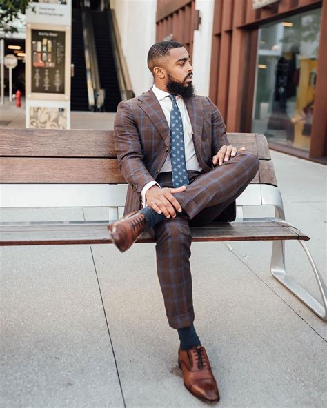Man In Striped Suit Sitting On Bench Suit Mensfashion Houston