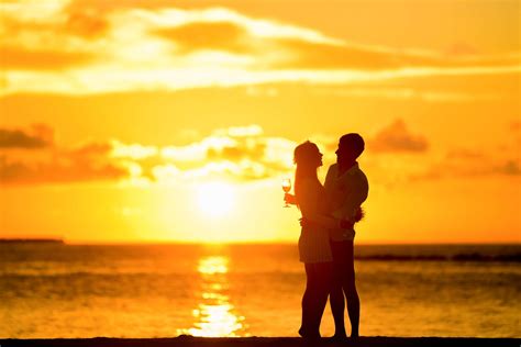 affection backlit beach blur clouds couple date dawn dusk hugging idyllic love