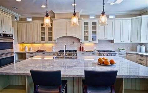 An oversized island can more than double the available counter space in your kitchen, while also acting as a perimeter for a kitchen without clearly defined boundaries. 37 Large Kitchen Islands with Seating (Pictures ...