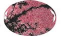 Rhodonite is a crystal filled with love and balance. Rhodonite Uses and Purposes | Crystal Vaults