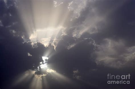 Sun Shining Through Clouds Photograph By Sami Sarkis Fine Art America