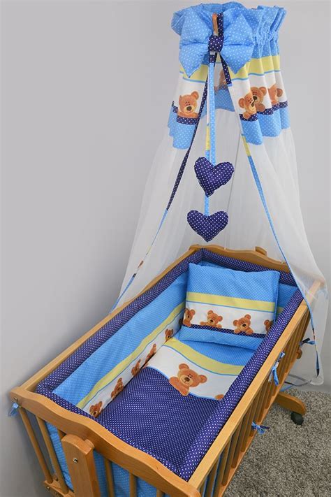 Typically a crib bedding collection consists of a quilt, a fitted crib sheet, a crib skirt and a diaper stacker; 9 Piece Baby Crib Bedding Set with All Round Padded Bumper ...