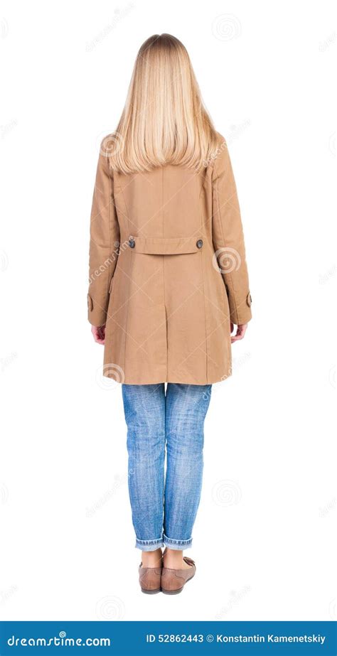 Back View Of Standing Young Beautiful Blonde Woman In Brown Clo Stock