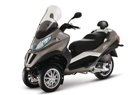 We see several mobility scooters in the market but a three wheel electric scooter is much more than just any mobility scooter. 2012 Piaggio Mp3 Touring LT 300 I.E. Review | Motorcycle News
