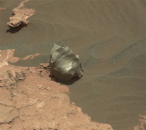 Mars Curiosity Rolls Up To Potential New Meteorite