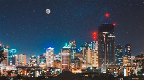 Free Download Hd Wallpaper Starry Night Above The City Buildings