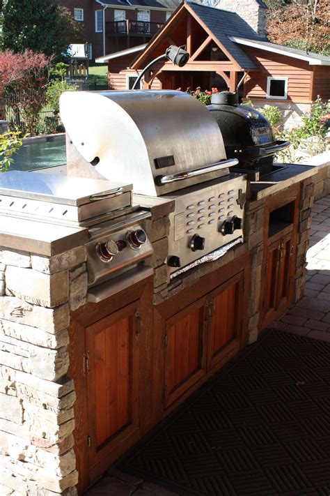 Additionally, large charcoal grills make great focus points in permanent outdoor kitchens. Built-in Grill..with gas and charcoal | Built in grill ...
