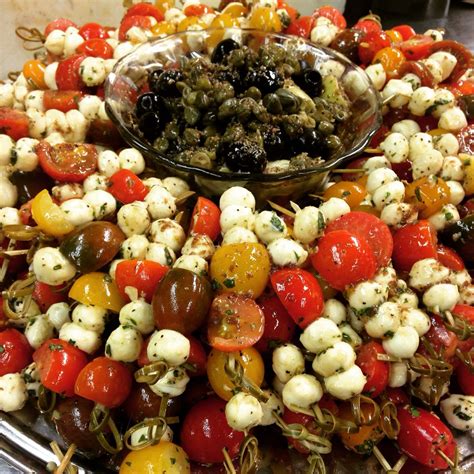 Not only are they a great taster for what's to come later, they'll also keep your guests stomach's from rumbling while they wait. Antipasti skewer | Skewer appetizers, Party appetizers ...