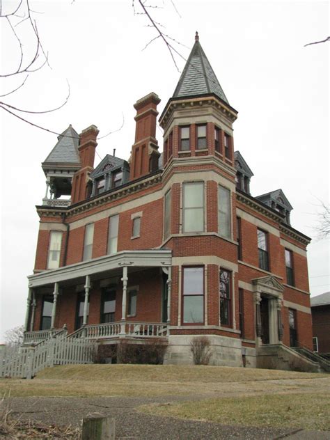 The Mansion Is A Three Story Brick Late Victorian Style Building With A