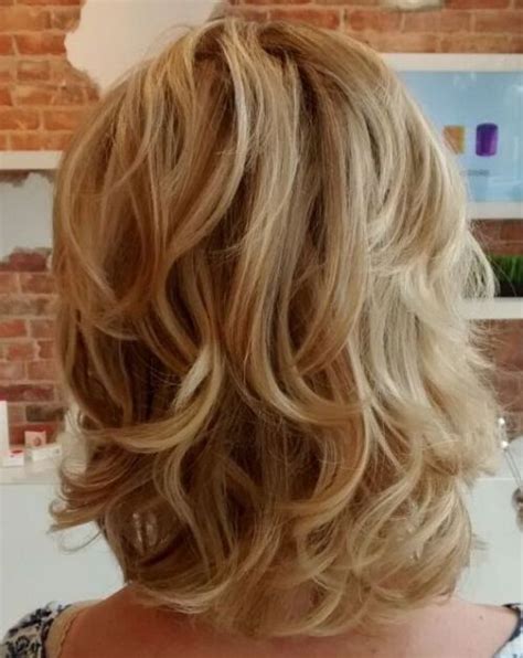 This hairstyle, as shown here, is a short bob which has been maintained at a single length across the entire face. 60 Fun and Flattering Medium Hairstyles for Women of All Ages