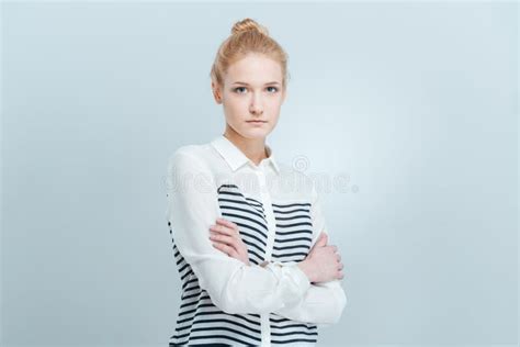 Young Woman Standing With Arms Folded Stock Photo Image Of Lifestyles