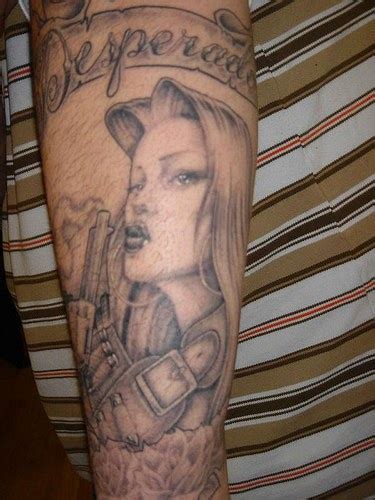 Beautiful Assured Girl With Weapon Forearm Tattoo Tattooimages Biz