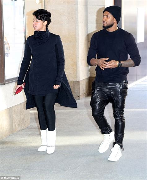 Usher And Fiancée Grace Miguel Dress To Match In All Black Outfits With Bright White Shoes