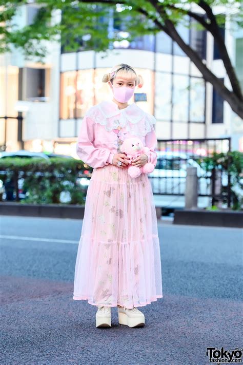Japanese Art Student Akane On The Street In Harajuku Wearing A Pink