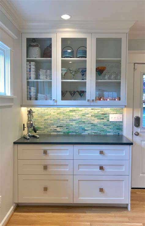 Then, kick it up a notch with decorative kitchen cabinet moulding, glass door kitchen cabinets and kitchen cabinets with pullout shelves. Glass front upper cabinets - Craftsman - Kitchen - Seattle ...