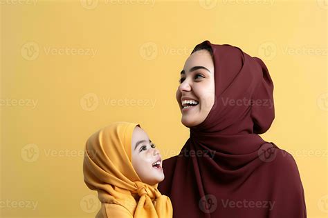 Portrait Of Muslim Mother And Daughter Smiling Over Yellow Background Ai Generated 32260231