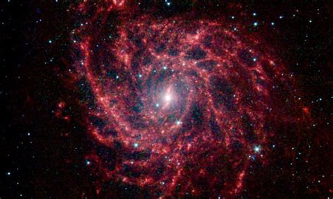 The Blue Stars Between Us And Our Dusty Red Spiral Galaxy Neighbour Ic
