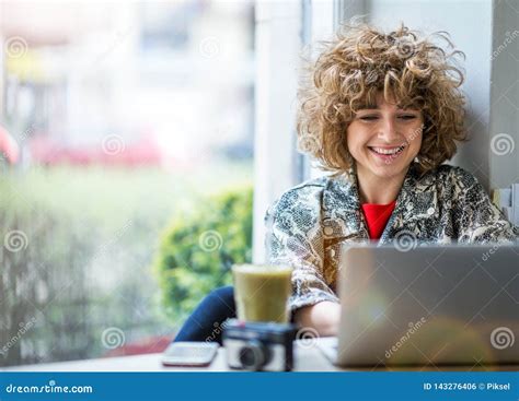 Young Woman Working On Her Laptop In Cafe Stock Photo Image Of Female