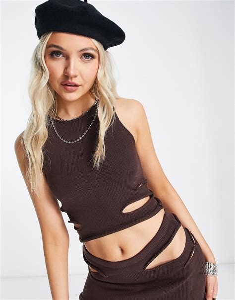 Niihai Cropped Tank Top With Cut Outs And Wrap Waist Part Of A Set