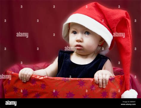 Baby With Santa Hat Stock Photo Alamy