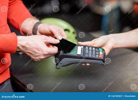 Man Buying With Card In The Sports Shop Stock Image Image Of Male