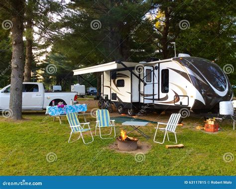 Camping On The Campground With Travel Trailer Stock Image Image Of