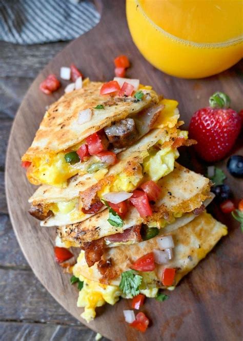 Breakfast Quesadillas Cut Into Fourths Laying On Their Side Next To