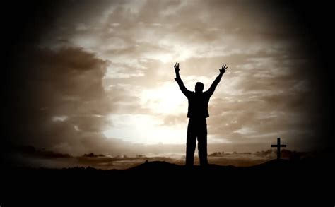 Success Pose Businessman Standing On Top Of A Mountain Raising Hands