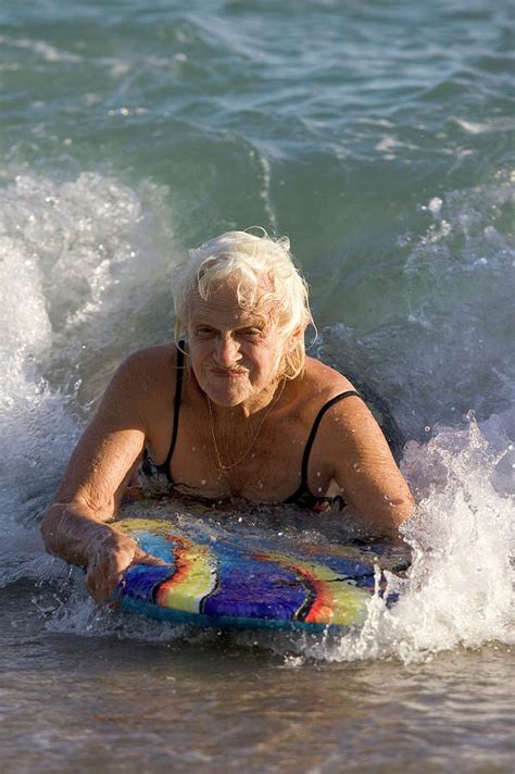 Russian women's knockout beauty is one of the most widespread stereotypes about them. 86-year-old Woman Boogie Boards Photograph by David McLain