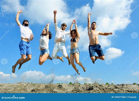 Image Of Young People Jumping Together Outdoor Stock Photo Image Of