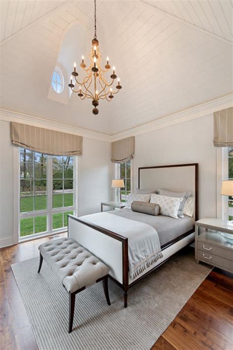 neutral guest bedroom  vaulted ceilings hgtv