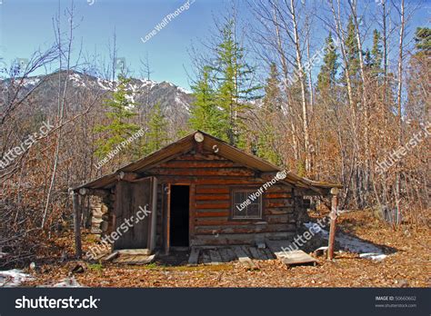 Maybe you would like to learn more about one of these? Log Cabin In Alaska In Autumn With Mountains Stock Photo ...