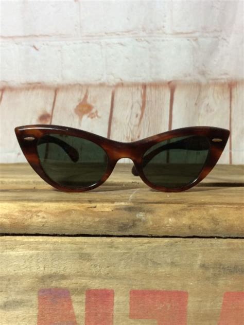 vintage ray ban sunglasses w cat eye style and tortoise shell frames boardwalk vintage