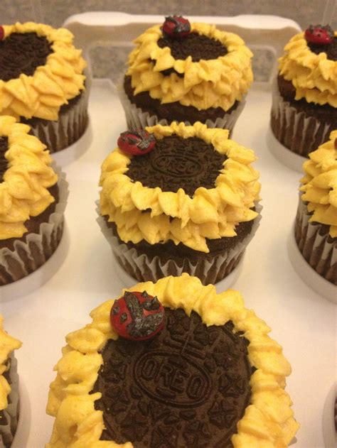 Turning the cupcake as you go, create a single layer of yellow flower petals surrounding the oreo. Oreo centers for the birthday girls sunflower cupcakes ...
