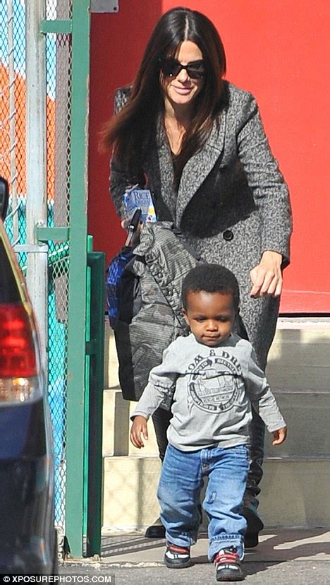 Sandra Bullock Has Her Hands Full With Son Louis As He Makes A Dash Daily Mail Online