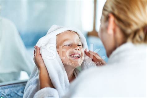 Mother Drying Up Son After Bath Stock Photo Royalty Free Freeimages