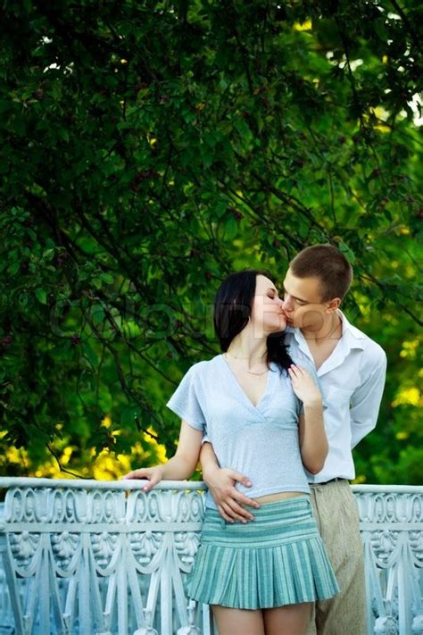 Kissing Couple In The Park Stock Image Colourbox