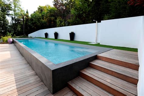 Half Burried Pool And Designer Furniture Architonic
