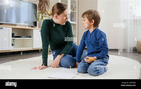 Young Displeases Mother Shouting And Talking Strictly To Her Son Doing