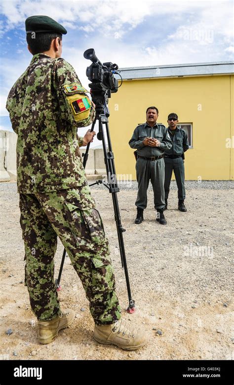 An Afghan National Army Public Affairs Officer Records An Interview