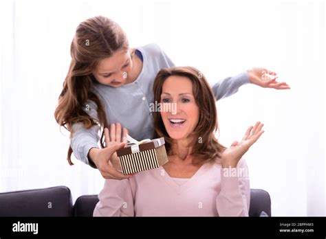 Daughter Covering Eyes Surprise T Hi Res Stock Photography And