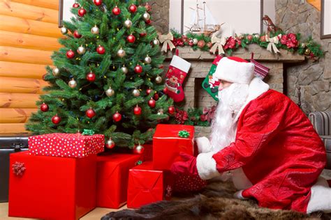 Santa Putting Ts Under The Tree